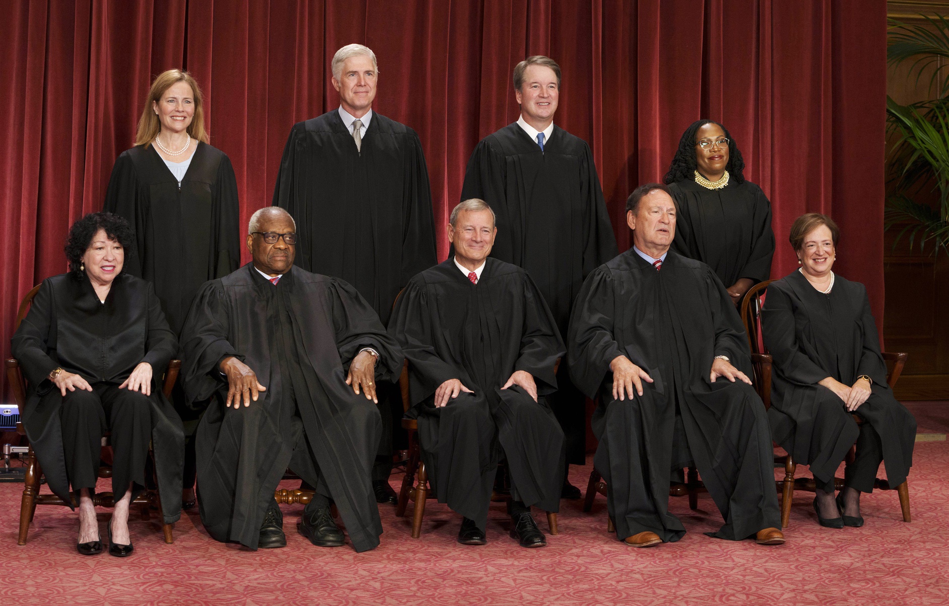 Members of the Supreme Court pose for a group photo 